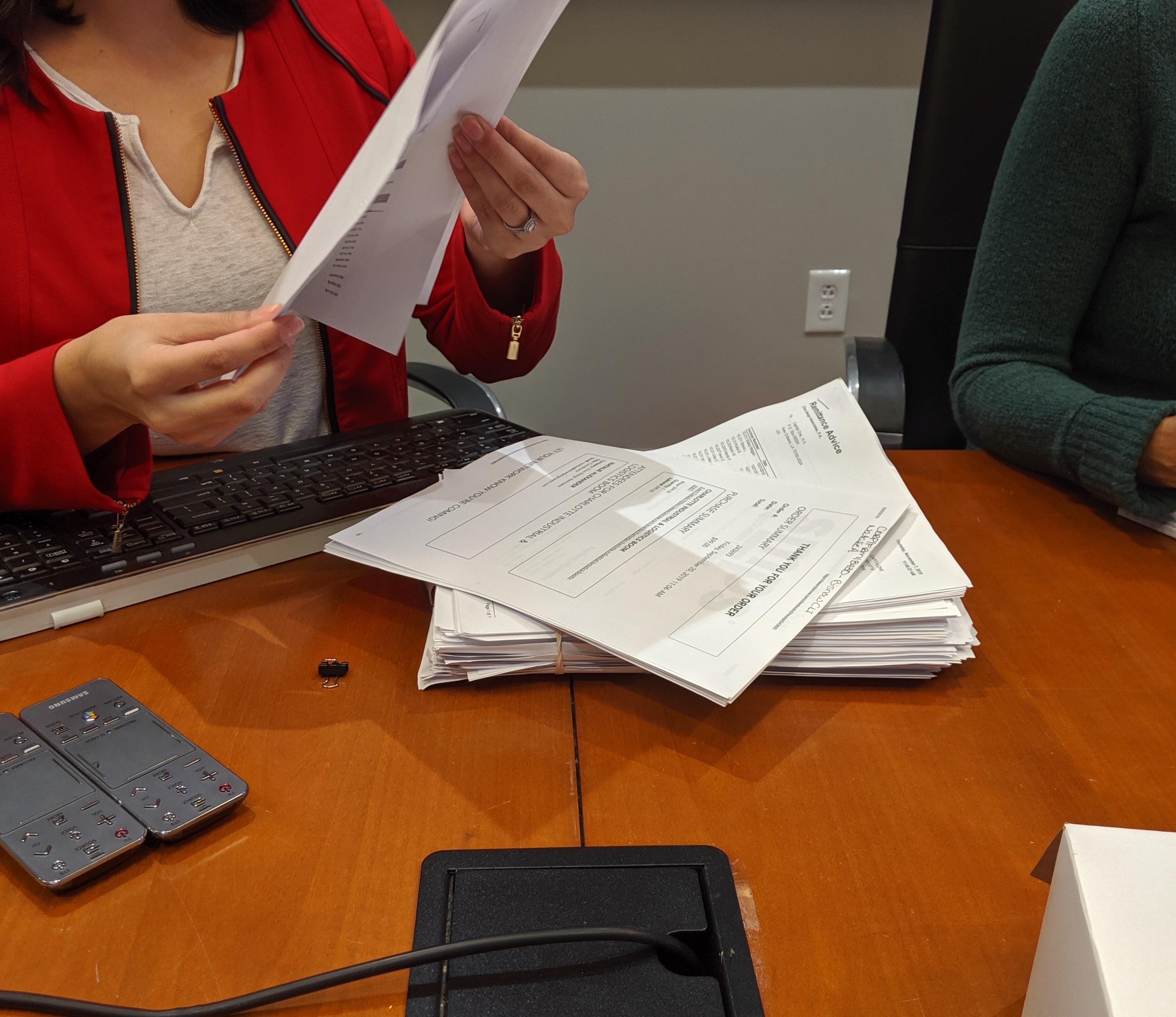 An admin manually reconciling a cardholder's transactions with their expense report